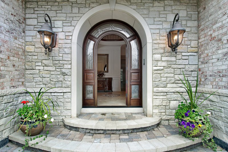 an arched front door 